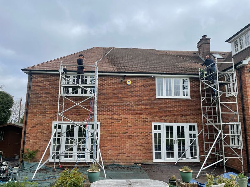 Roof cleaning carried out safely from scaffold towers by The Roof Moss Cleaners in Banbury